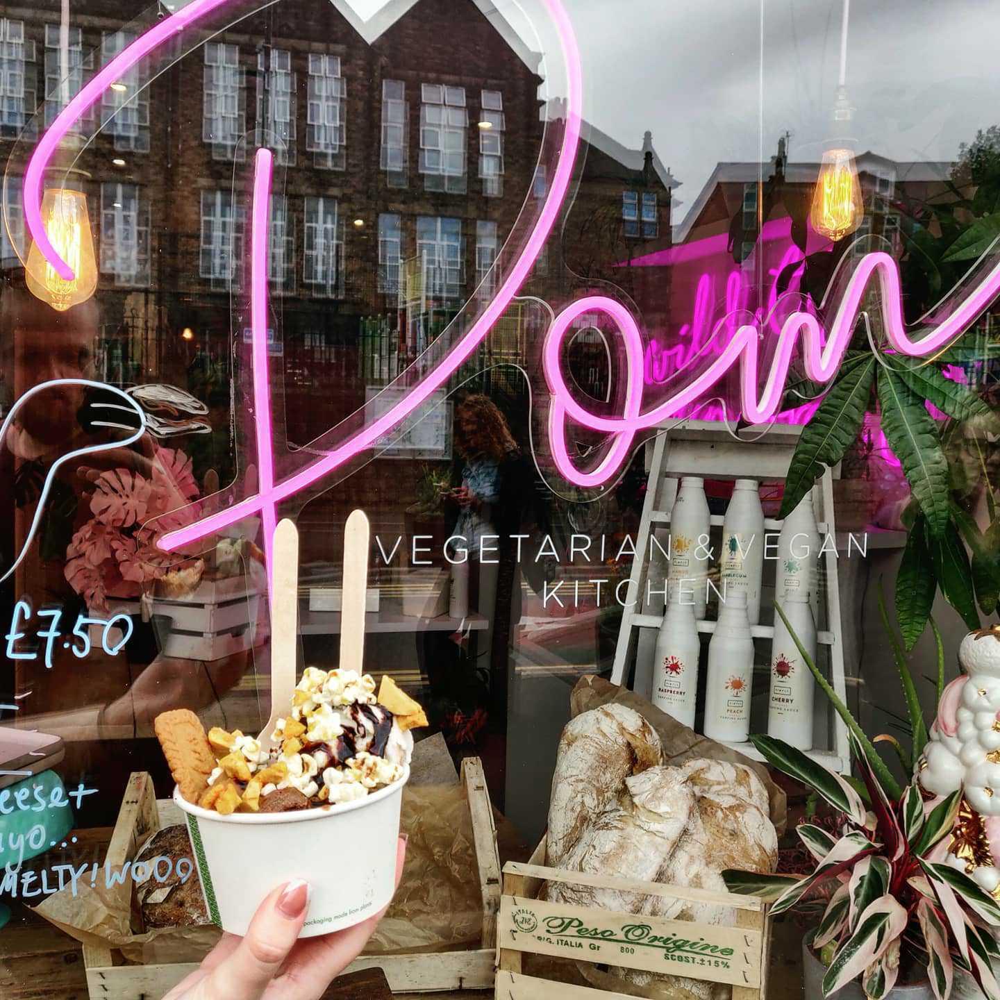 An ice cream sundae outside Pom Kitchen's shop window